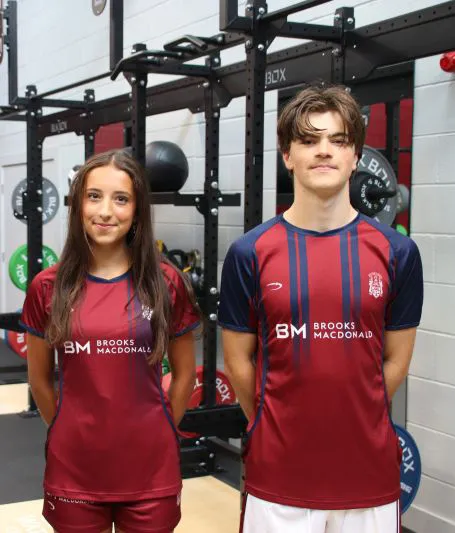 Teens in sponsored sports clothes