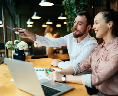 Two business people working