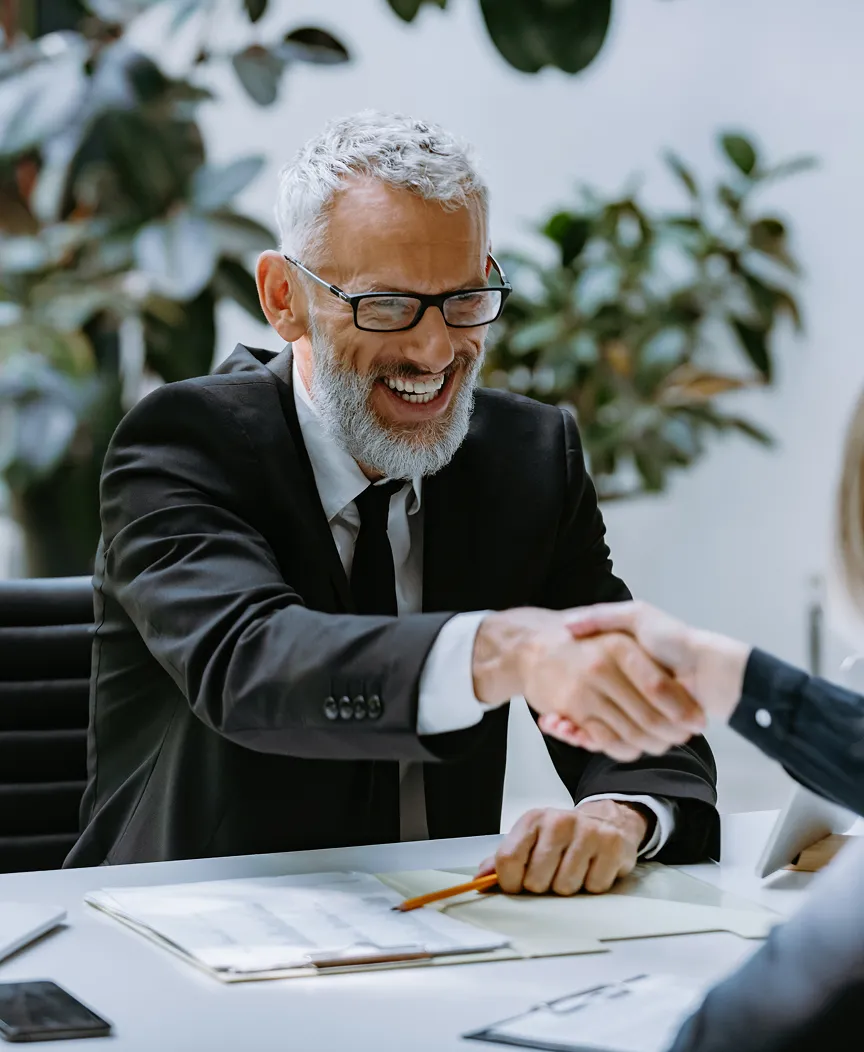 Experienced businessman handshake