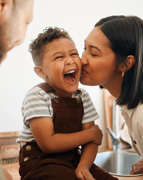 Family image of young child with mother and father