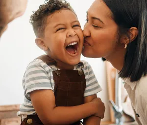 Family image of young child with mother and father